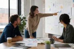 Colleagues discussing growth strategy in small business success.