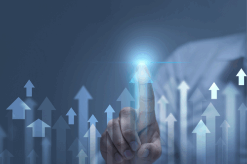 7 Simple Tips for a Smooth Transition to Factoring - Hand pressing a glowing upward arrow, signifying business growth and successful factoring transition
