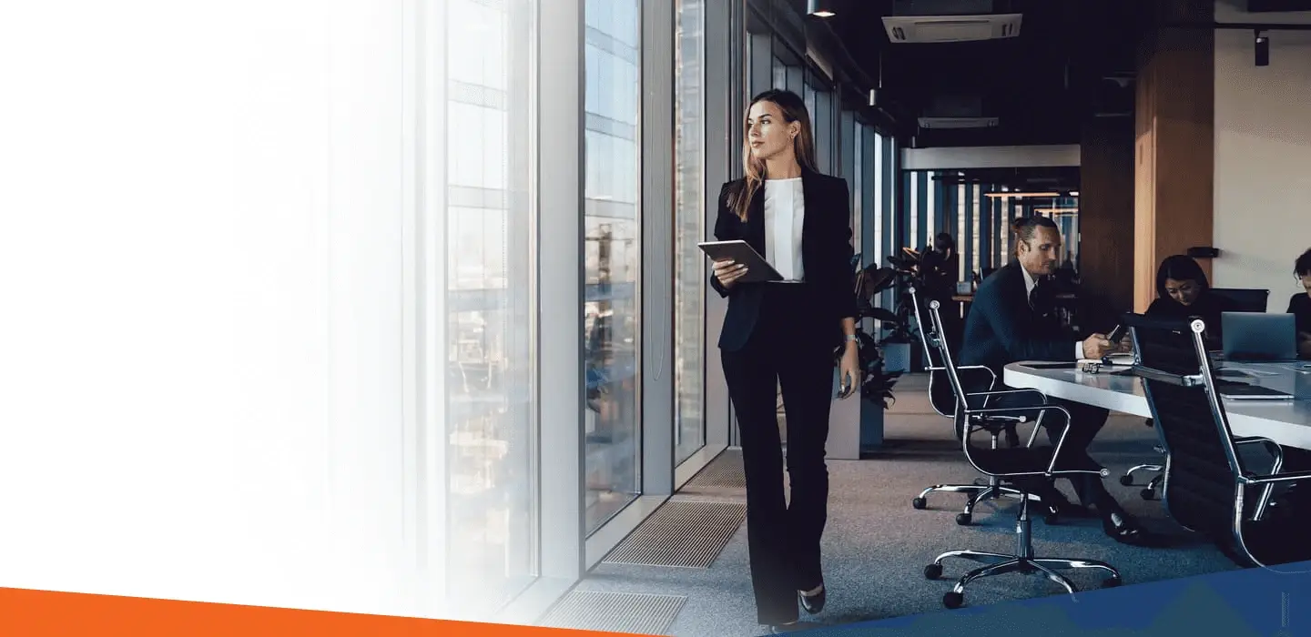 Professional businesswoman in a modern office, representing financial solutions and cash flow management.