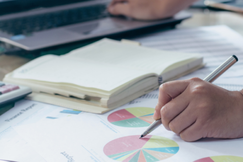 A business owner reviewing a cash flow forecast, part of the top 7 things business owners should have but often don’t